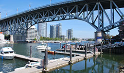 The Granville Bridge viewed from the seawall. Image courtesy of the West End on Flickr.